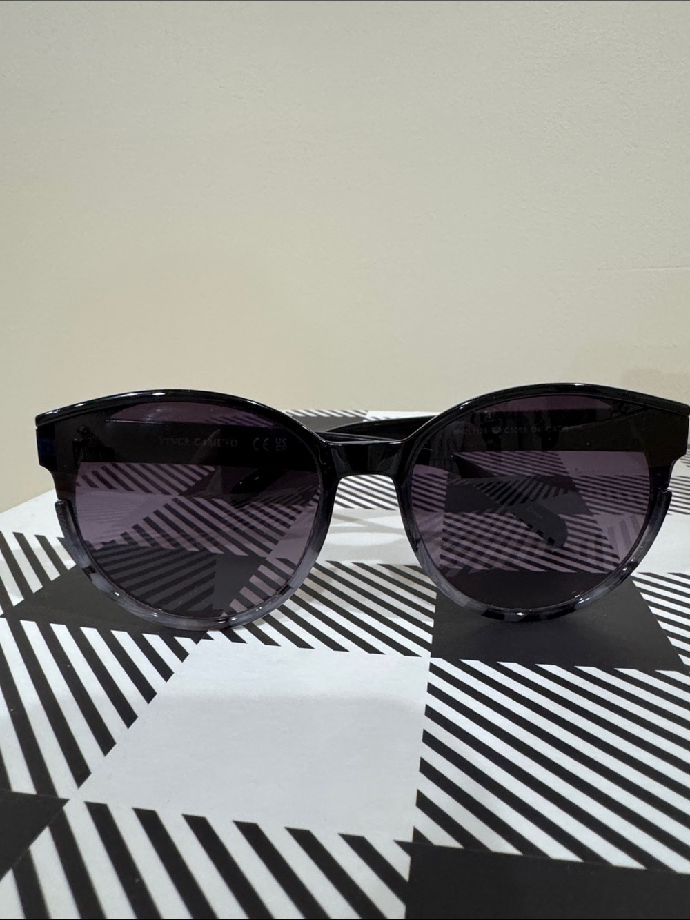 Vince Camuto Black Frame Sunglasses with Dark Purple Lenses